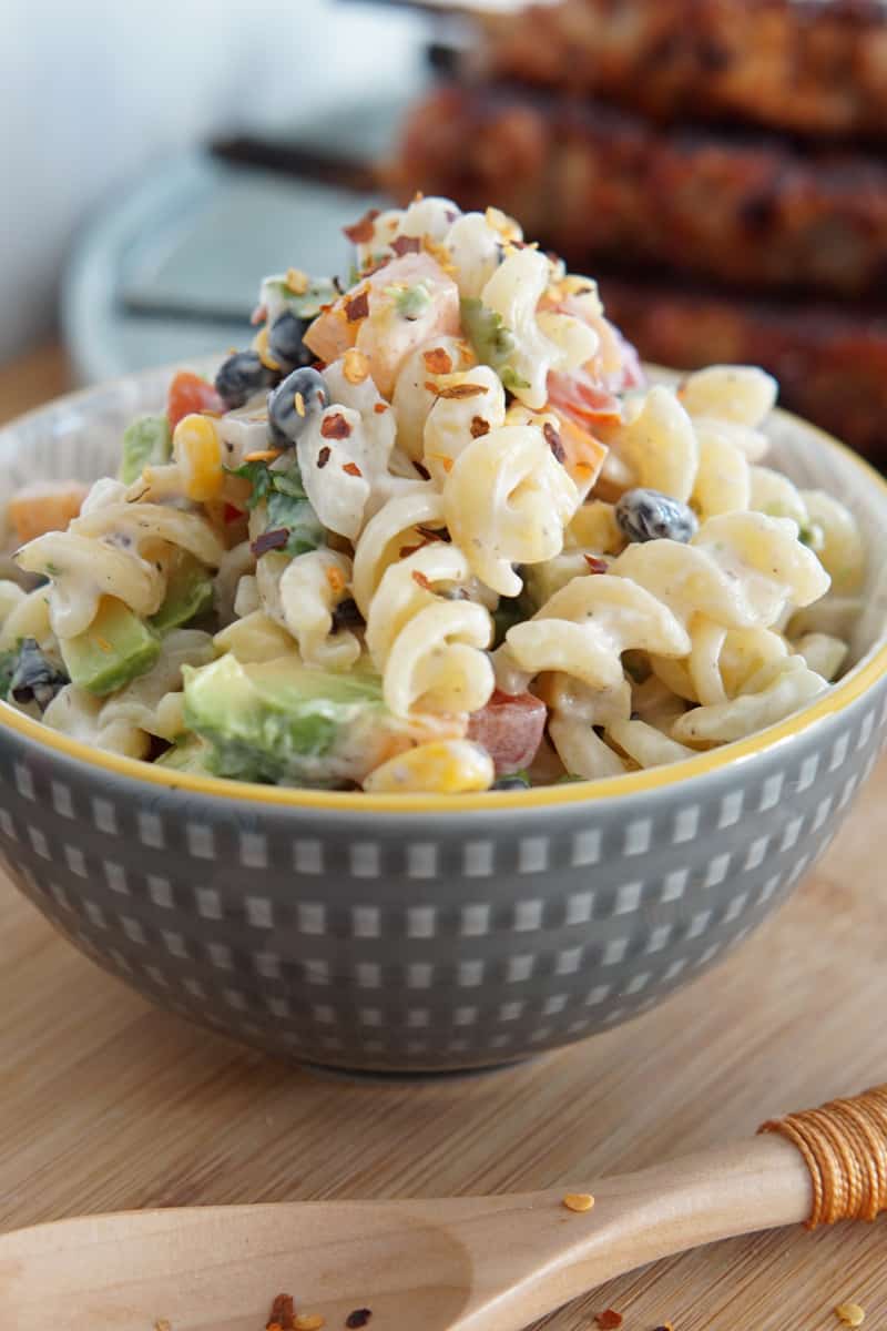 A bowl of corn and black bean pasta salad
