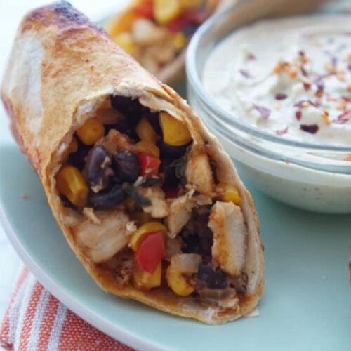 Southwest eggroll cut in half with dipping sauce