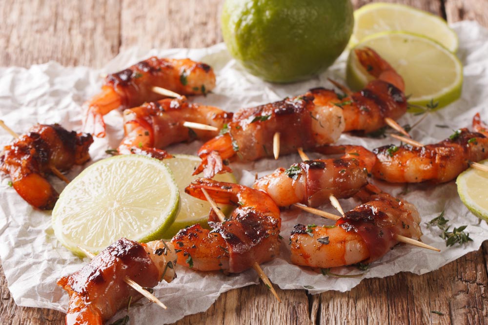 Cooked shrimp wrapped in bacon