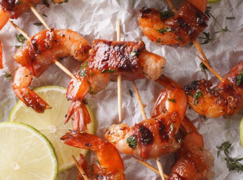 Cooked shrimp wrapped in bacon