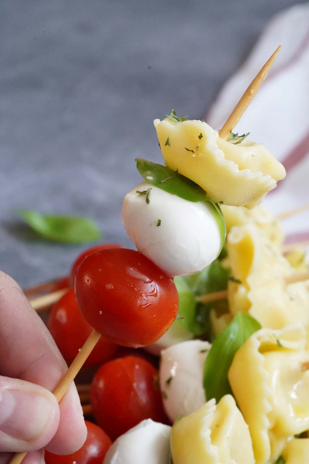 One caprese tortellini skewer
