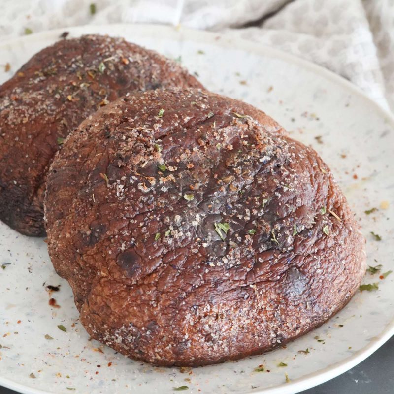 Two cooked Portobello mushrooms