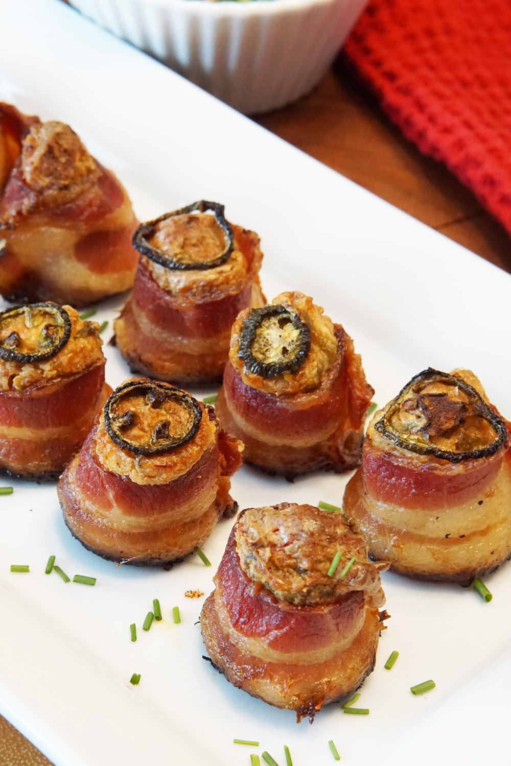 Bacon wrapped sausage with cream cheese filling