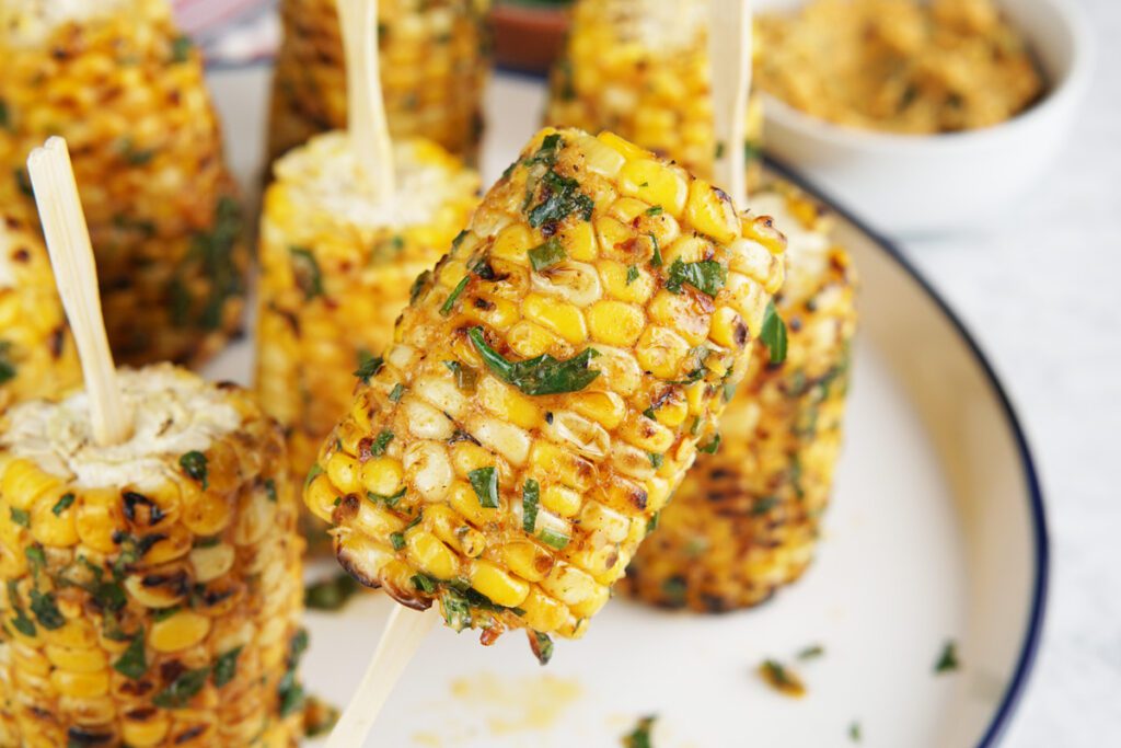 Corn lollipops with cowboy butter