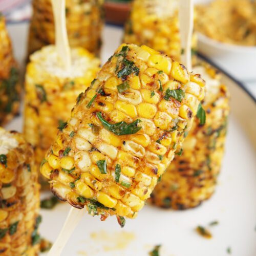 Corn lollipops with cowboy butter