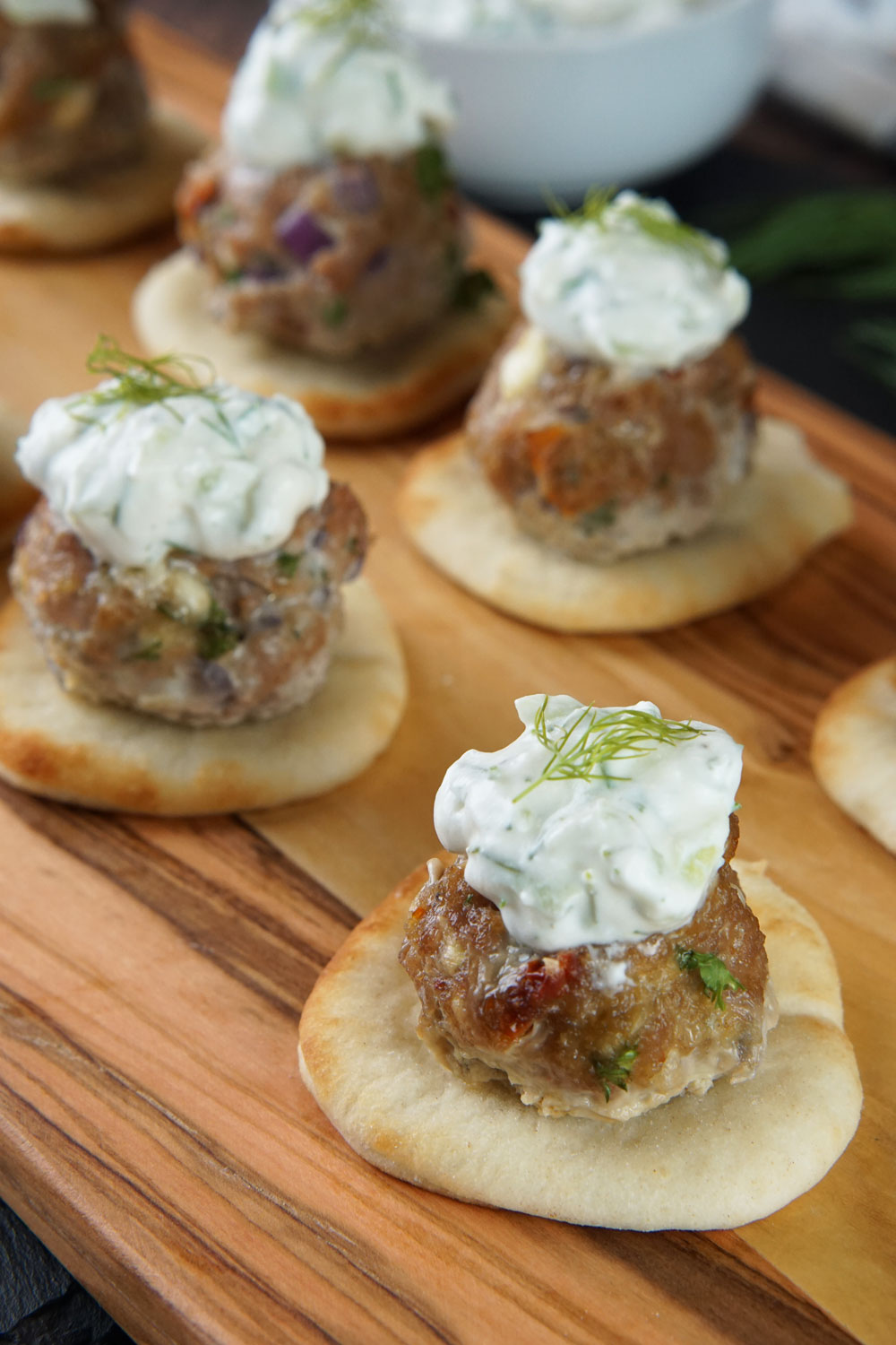 Greek meatballs on naan with tzatziki