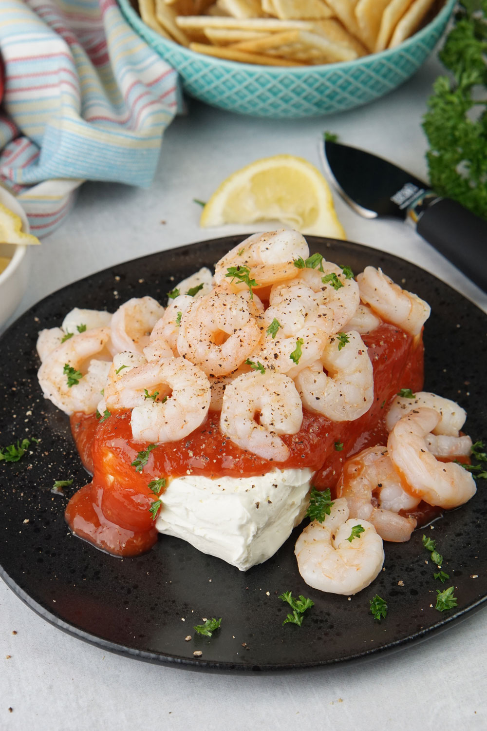 Shrimp and cream cheese on a cracker