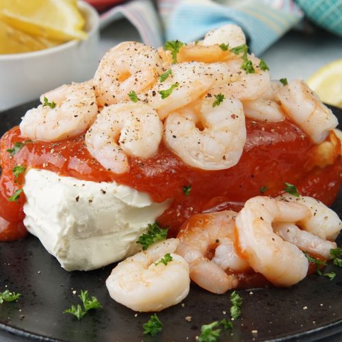 Shrimp and cream cheese on a cracker