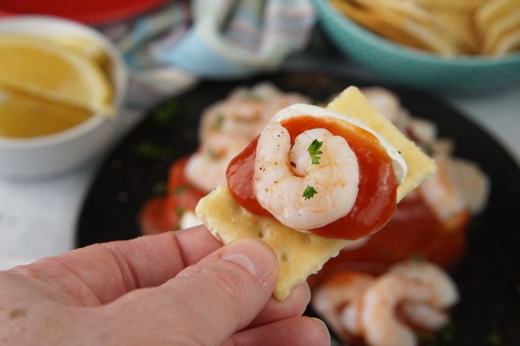 Shrimp and cream cheese on a cracker